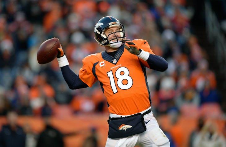 A quarterback wearing a Denver Broncos jersey and cap throwing a football during a game.
